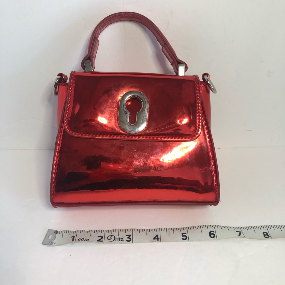 Skinny Dip Shiny Small Red Handbag. Coca-Cola Inner Lining. Magnet Closure. - Picture 8 of 9